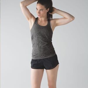 Lululemon swiftly tech tank top! Hip length size 4